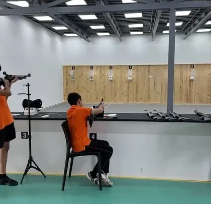 A wide shot of the Candor International School students at the firing line. Our spacious range allows us to comfortably accommodate school groups for dedicated training programs.
