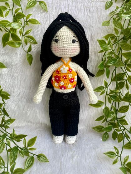 This replica doll features beautiful braided hair and a floral halter top. The customer requested no mouth for a unique, stylized look, which I think turned out so sweet and artistic.
