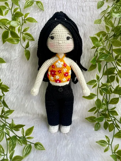 This replica doll features beautiful braided hair and a floral halter top. The customer requested no mouth for a unique, stylized look, which I think turned out so sweet and artistic.
