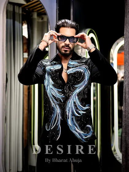 A powerful, direct pose in the abstract wave shirt. This is for the man who wants to unleash his inner fire.