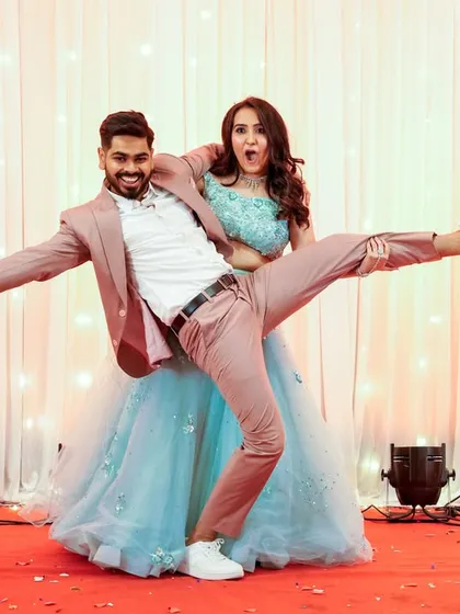 A hilarious and high-energy performance by the couple. This photo perfectly captures their fun-loving personalities.