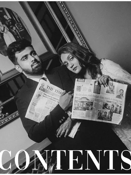 Another shot from the creative newspaper theme, with dramatic lighting and posing. The black and white edit enhances the cinematic and storytelling quality of the image.