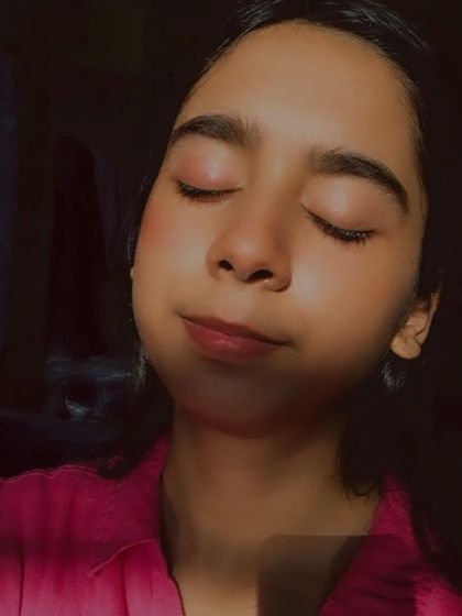 A customer enjoying the natural flush from my lip tint, which can also be used on the cheeks for a healthy glow.