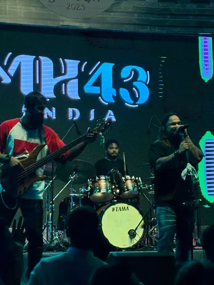 Another shot of the band in action, showing the energy we bring to the corporate stage.