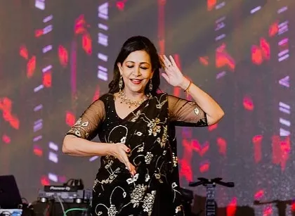 A mother's graceful performance, full of expression and joy.