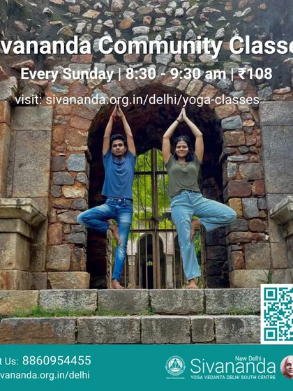 Our community classes are open to everyone. This image shows two practitioners in Vrikshasana (Tree Pose), symbolizing the balance and connection we cultivate in our community.