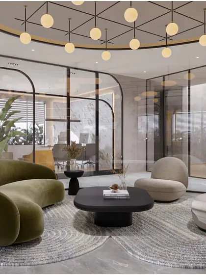 This is a glimpse into a modern head office I designed to be energetic and community-driven. The curved glass partitions, sculptural furniture, and thoughtful lighting create a welcoming lounge area that encourages collaboration and feels distinct from a typical corporate environment.