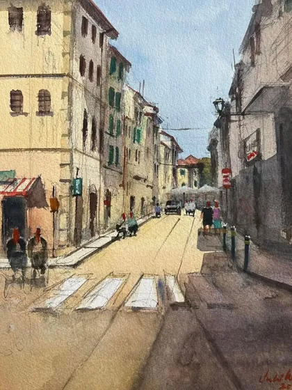 A cityscape of Pisa, Italy, which was displayed at the IWS watercolor festival in Noida. This piece captures a quiet street scene with a focus on perspective and light.