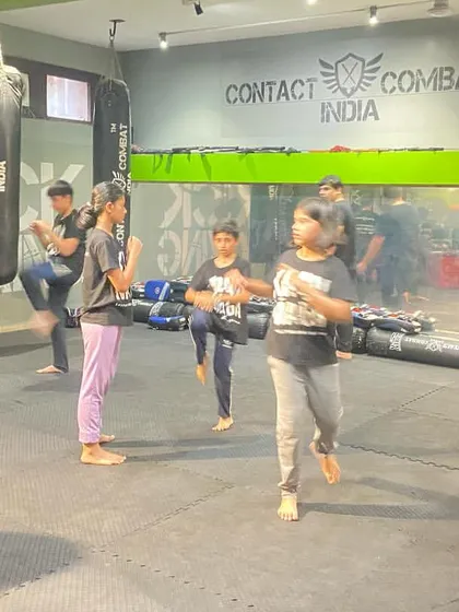 Young students practicing their defensive stances and movements. We teach them awareness and basic self-defense from an early age.
