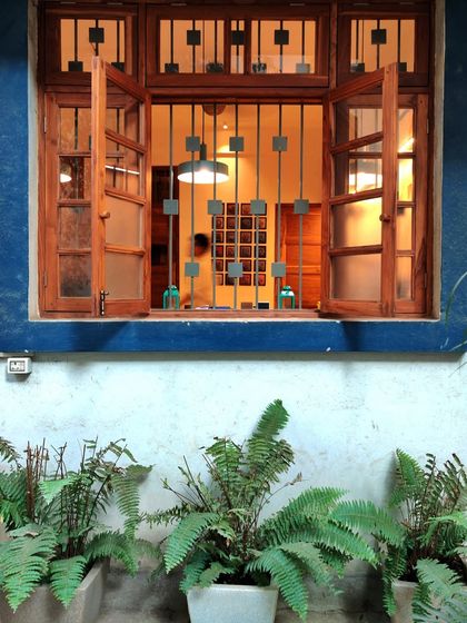 Our office is Nikita's family home, a heritage bungalow in Chembur designed over 60 years ago. We feel a deep responsibility to preserve its legacy, maintaining its timeless facade, terrazzo floors, and intricate grill work.