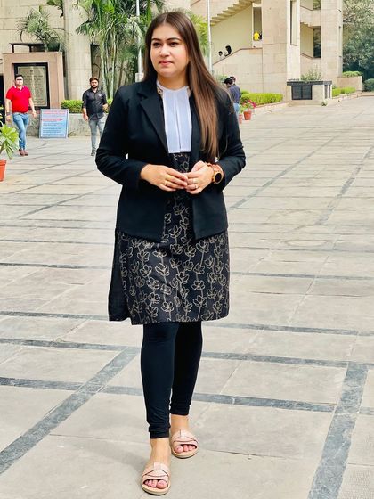 Focused and ready for the day's legal battles outside the courthouse.