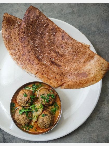 My Khaima Unde Saaru paired with a crispy dosa, a combination that is both traditional and incredibly delicious.