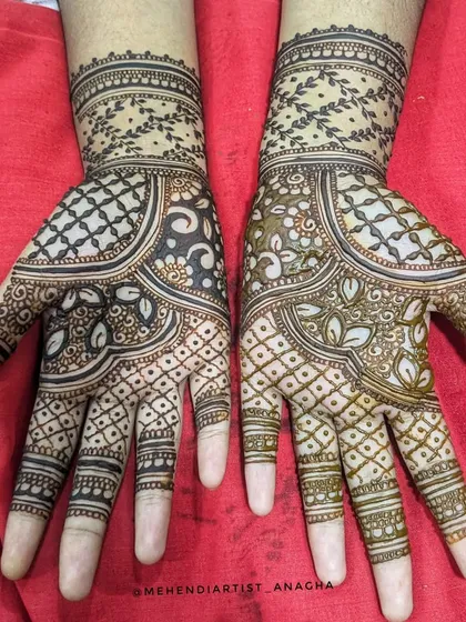 This design is a beautiful choice for a bridesmaid or wedding guest. It features flowing patterns with floral and geometric elements, providing good coverage without being too heavy.