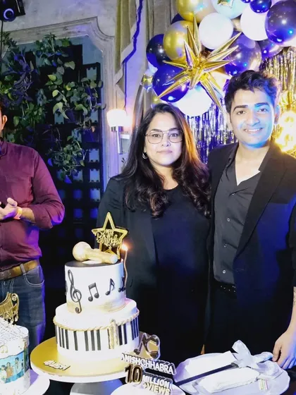 I was so happy to be at Anish Chhabra's celebration and pose for a photo with him and the cakes I created for his special night.