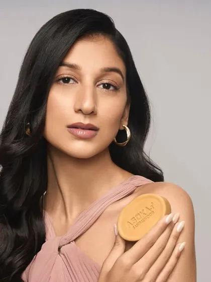 A clean beauty look for a soap brand campaign. The makeup is minimal and matte, with a soft contour and a neutral lip to create a sophisticated and natural appearance.