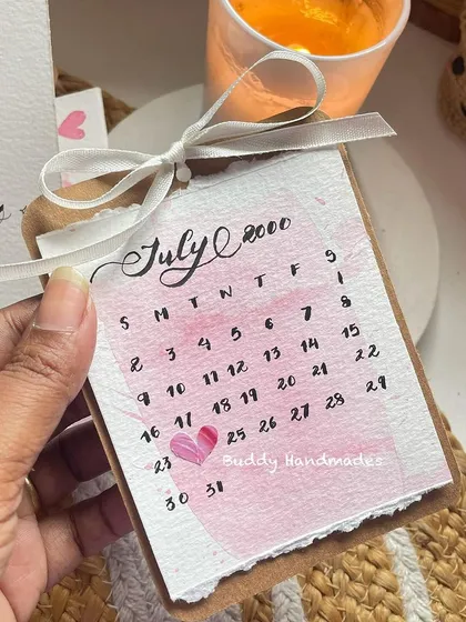 Another look at the mini calendar card, perfect for commemorating a special day. This one is tied with a simple white ribbon.
