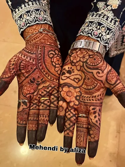 A mature henna stain on a design with cute paw prints. The color is deep and rich, just as it should be.