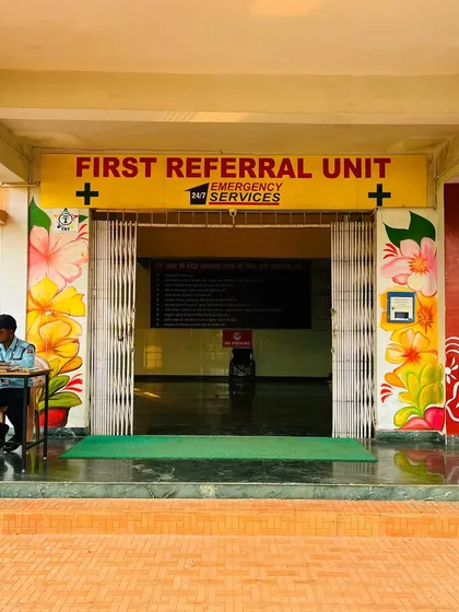The entrance to the First Referral Unit in Jharkhand. I painted the pillars with bright, floral, and traditional motifs to make the hospital entrance more vibrant and less intimidating for visitors.