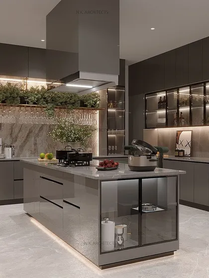 A kitchen with a grey and golden scheme can create a luxurious and modern look. This design features an island with a breakfast counter, sleek grey cabinets, and warm under-cabinet lighting.