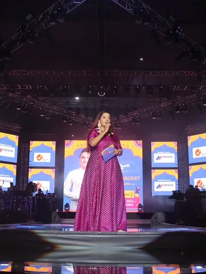 Commanding the stage on the final day of Rangilo Re 2024. This wide shot showcases my stage presence against the backdrop of the massive event production.