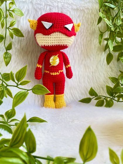The Flash! This superhero doll was made with a special head shape as requested by the customer. I love getting the details right, like the lightning bolt emblem on his chest.