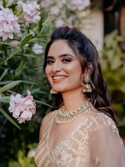 My favorite muse of the season. I was so glad to curate all her looks, starting with this stunning sangeet style featuring a soft smokey eye and beautiful wavy hair.