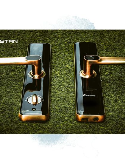 This elegant smart lock in a bronze and black finish is perfect for luxury interiors. It combines sophisticated aesthetics with the convenience of smart technology.