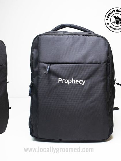 This sleek black backpack for Prophecy is a classic and professional choice, suitable for any corporate environment.