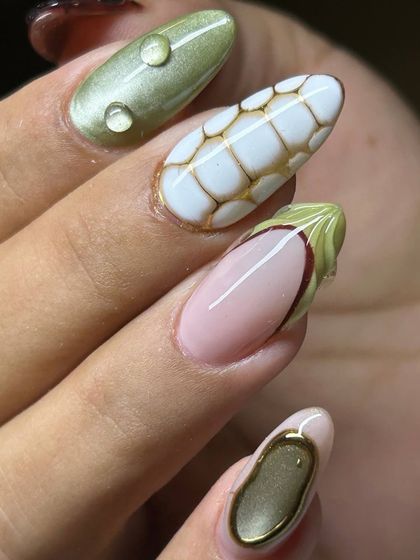 An incredibly creative and artistic nail set. This design features a mix of textures and patterns, including a 3D 'corn cob' effect, water droplets, and abstract gold lines on an earthy green and nude base.