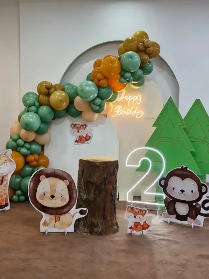 This wide shot shows the complete modern jungle setup, perfect for an indoor space. The layout is designed for great photos and easy interaction.