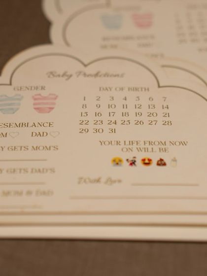 These custom cloud-shaped 'Baby Predictions' cards are a sweet and interactive keepsake. Guests can write their wishes and guesses for the parents-to-be to read and cherish later.