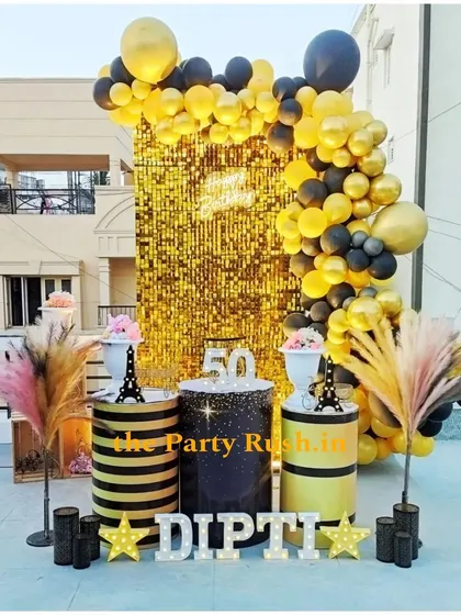 Celebrating a 50th birthday calls for something special, and for Dipti's party, I created this chic and sophisticated black and gold theme. The setup includes a shimmering sequin wall, elegant balloon garlands, and personalized marquee lights, proving that milestone parties can be both fun and stylish.