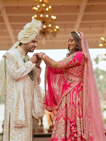 A sweet moment between the bride and groom during their wedding ceremony.
