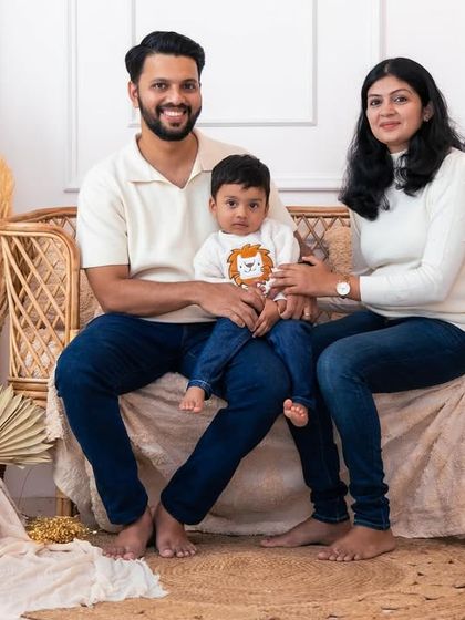 A beautiful family portrait in our full boho setup. The pampas grass and natural elements create a warm and trendy aesthetic.