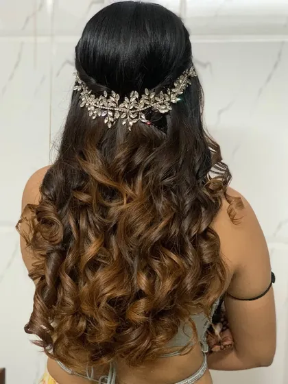 Beautifully textured curls for a bridesmaid. This half-up, half-down style is glamorous and perfect for any member of the bridal party.