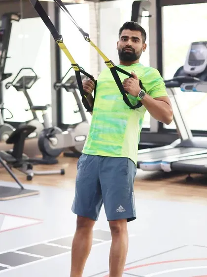The real workout starts when you want to stop. Using tools like the TRX suspension trainer, I constantly challenge myself to push past my limits.
