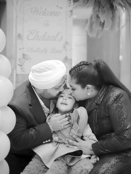 A black and white version of a family hug, highlighting the emotion and connection. We often provide a mix of color and monochrome images.
