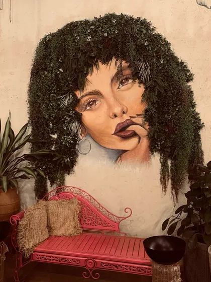 Come find your favorite photo spot. Our unique wall art, with real plants for hair, is a favorite for Instagram clicks and adds to the artistic, green aesthetic of our space. It’s a perfect blend of nature and art.