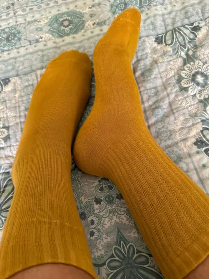 Another look at the marigold-dyed socks. It's a small but meaningful way to incorporate sustainable, handmade items into your daily life.