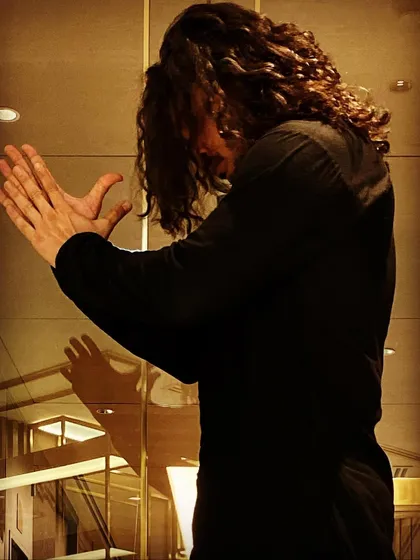 Behind the scenes in the green room before a show. A moment for warm-ups, reflection, and maybe trying to master the art of taking a good selfie.