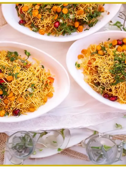 The iconic taste of Mumbai street food, perfected for your event. Our Sev Puri is a burst of tangy, spicy, and crunchy flavors, beautifully presented in white bowls.