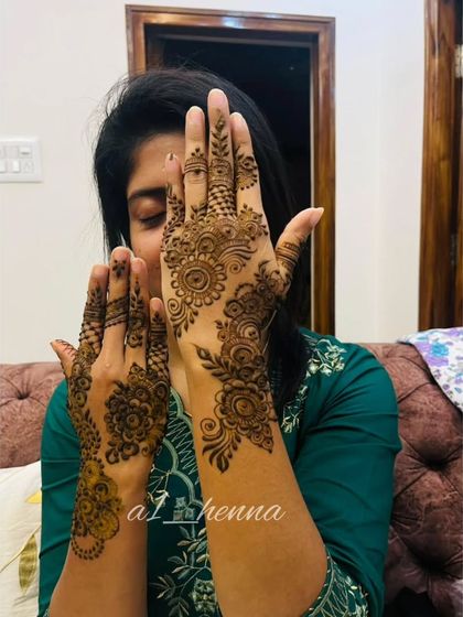 Another pose with the elegant Arabic design.