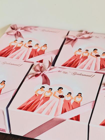 The elegant satin ribbon and custom illustration make these magnetic closure boxes a truly special way to propose to your bridesmaids.