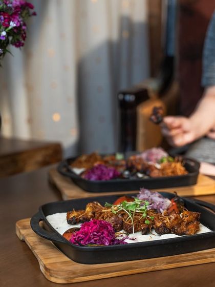 Unleash your inner epicurean with our gourmet Turkish chicken wings. Served on a sizzling platter, they are a symphony of flavor and finesse that elevates the ordinary to extraordinary.