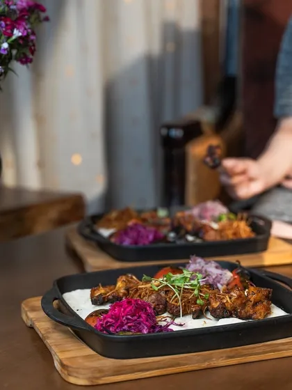 Unleash your inner epicurean with our gourmet Turkish chicken wings. Served on a sizzling platter, they are a symphony of flavor and finesse that elevates the ordinary to extraordinary.