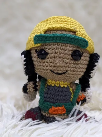 A side view of the Raze doll.