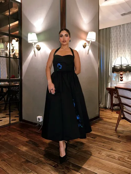 This is a classic Gauri & Nainika black halter dress I chose for Bhumi Pednekar for a Filmfare press conference. The timeless silhouette paired with unique floral earrings makes for an effortlessly glamorous look.