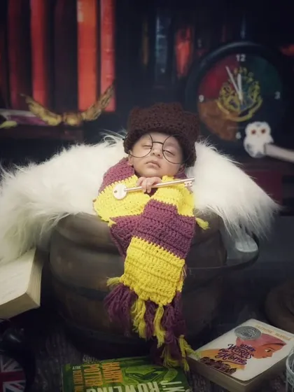 For the fans of magic, I present the Harry Potter theme. This newborn is ready for Hogwarts, complete with a Gryffindor scarf, a wand, and a collection of spellbooks. I love bringing your imaginative ideas to life with detailed and safe setups.
