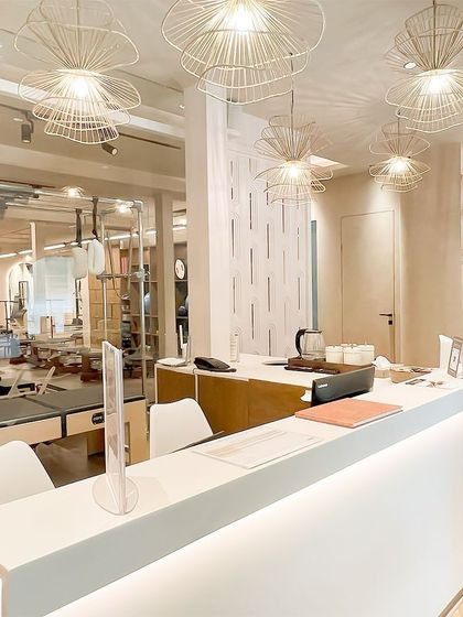 A view of our GK1 studio reception, where modern design meets a tranquil atmosphere. This is where the Pilates energy begins to flow.