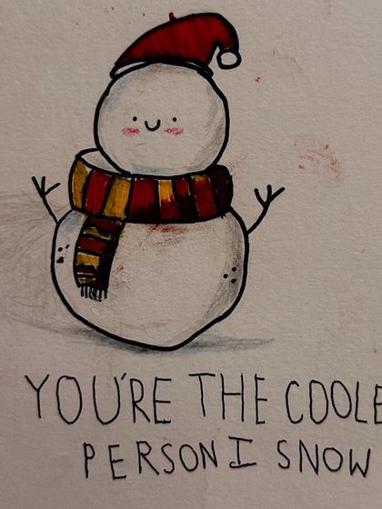 A close-up of the adorable snowman illustration, showcasing the student's clean line work and cute design.
